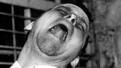 film still: Mr Marker screams pointlessly in frustration

