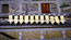 Line on yellow plates: This shot is one of a number in the film where I mixed scratching marks made directly on to unprocessed celluloid and scanned on to my PC, with stills images of the site. In this case the scratch was a longish wavy line, scanned in reverse (dark scratch on light background) &amp; laid over images of the line on the series of yellow plates. The next step was to rub out, on PC using a software package called AURA, the points where the scratches extended beyond the plates.

